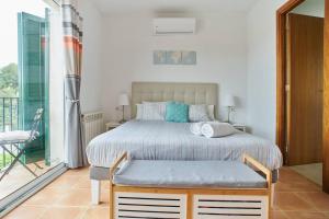 Ένα ή περισσότερα κρεβάτια σε δωμάτιο στο Casa Garcia
