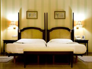 Krevet ili kreveti u jedinici u okviru objekta Hotel Jerez & Spa