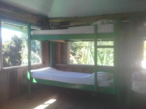 Postel nebo postele na pokoji v ubytování Hospedagem ocean view ilha g