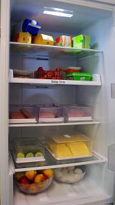 an open refrigerator filled with lots of food at Citimotel in Lappeenranta