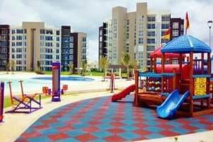a playground with a slide at Casa con alberca y laguna in Veracruz