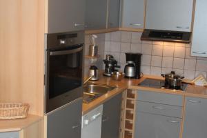 Kuchyň nebo kuchyňský kout v ubytování Ferienhaus Eifelperle