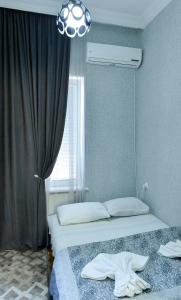 Katil atau katil-katil dalam bilik di Bibi