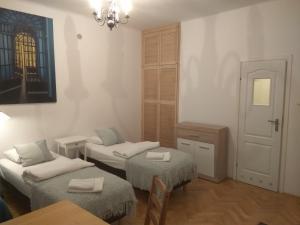 Posteľ alebo postele v izbe v ubytovaní Studio Iwicka