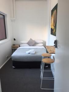 Postel nebo postele na pokoji v ubytování Manly Beach Guesthouse