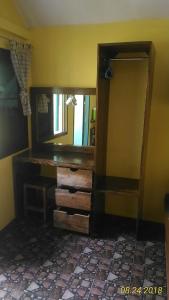 a room with a mirror and a dresser in a room at Island Lodge in Ko Chang +162 photos