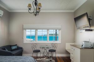 TV o dispositivi per l'intrattenimento presso The Ark Stanley Luxury Bed and Breakfast
