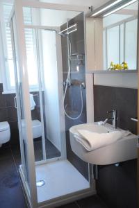 Koupelna v ubytování Hotel Astoria