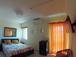 a bedroom with a bed and a window at My Guest House in Portimão +61 photos