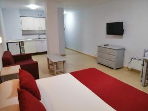 Cama o camas de una habitación en Apartamentos Puerta del Sur