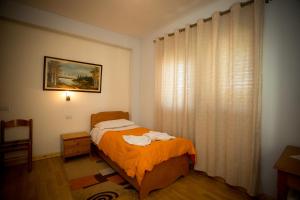 Uma cama ou camas num quarto em Kolping