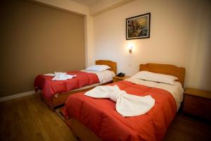 Uma cama ou camas num quarto em Kolping