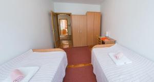Postel nebo postele na pokoji v ubytování Guest House Agava