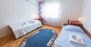 Postel nebo postele na pokoji v ubytování Guest House Agava