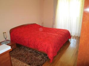 Łóżko lub łóżka w pokoju w obiekcie Apartments Villa Fernetich