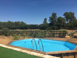 Bazén v ubytovaní Finca Sa Cova de Mallorca alebo v jeho blízkosti