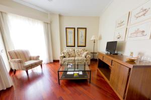 Telewizja i/lub zestaw kina domowego w obiekcie Hotel Traíña
