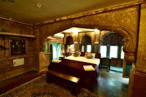 Postel nebo postele na pokoji v ubytování The Arch Boutique Home stay