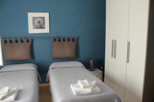 Postel nebo postele na pokoji v ubytování B&B Palatium S.G.