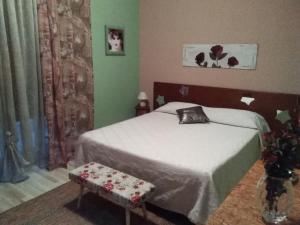 Postel nebo postele na pokoji v ubytování B&B "Al Calopinace"