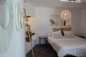Posteľ alebo postele v izbe v ubytovaní B&B La Mimosa
