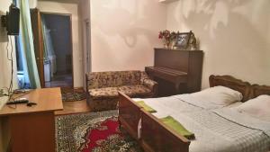 Cama ou camas em um quarto em Nana's Apartment in Batumi
