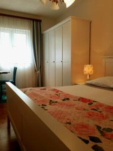 Postel nebo postele na pokoji v ubytování Apartments Vrisak