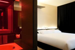 Postel nebo postele na pokoji v ubytování Axel Hotel Berlin - Adults Only