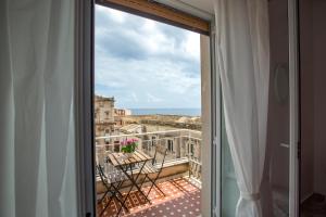 Balkón alebo terasa v ubytovaní Maison Ortigia