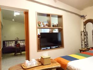 Televisyen dan/atau pusat hiburan di Jilufugan B&B