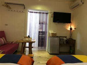 Televisyen dan/atau pusat hiburan di Jilufugan B&B
