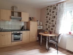 Η κουζίνα ή μικρή κουζίνα στο Ferienwohnung Mittelmühle