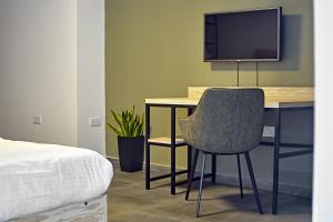 TV a/nebo společenská místnost v ubytování Mr Todd Hotel