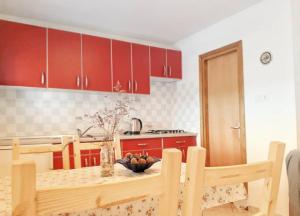 Kuchyňa alebo kuchynka v ubytovaní Apartmani Mia
