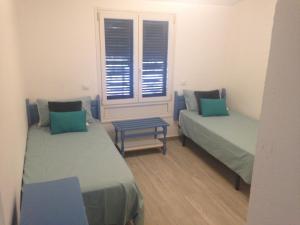 Postel nebo postele na pokoji v ubytování Bungalow Playa del Inglés centre + 17 fotografií