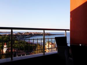 a balcony with a view of the water at Family Hotel Radiana in Sozopol