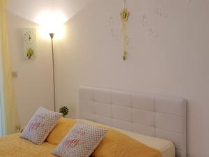 Postel nebo postele na pokoji v ubytování Apartment Rosana