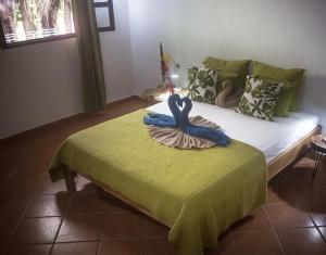 Giường trong phòng chung tại Manala Hotel