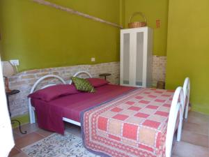 Postel nebo postele na pokoji v ubytování B&B Cà Giovanni Country Resort