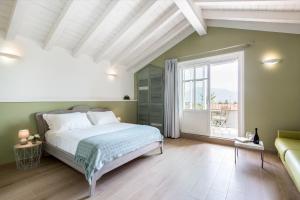 Un pat sau paturi într-o cameră la Residenza La Zagara