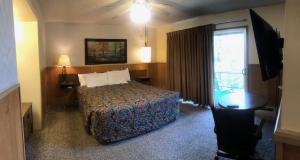 Posteľ alebo postele v izbe v ubytovaní Boulder Lodge
