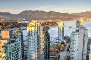 an aerial view of a city with buildings at Sky Residence Club in Vancouver