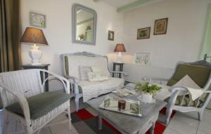 Posezení v ubytování La grange au tracteur + 1 fotografie