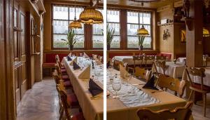 a dining room with a long table and chairs at Hotel Restaurant Goger in Haßfurt