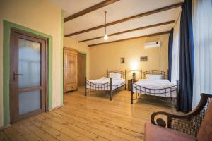 Letto o letti in una camera di Chateau Mere