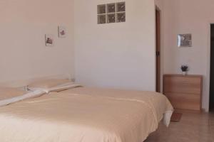 Posteľ alebo postele v izbe v ubytovaní Oasis Atlántico: rincón secreto al pie de los senderos