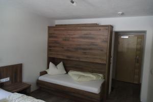 Łóżko lub łóżka w pokoju w obiekcie Apart Felsenhof