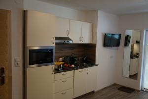Kuchnia lub aneks kuchenny w obiekcie Apart Felsenhof