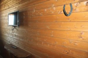 Televízia a/alebo spoločenská miestnosť v ubytovaní Villaggio San Demetrio