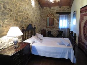 Postel nebo postele na pokoji v ubytování Neverending Bierzo